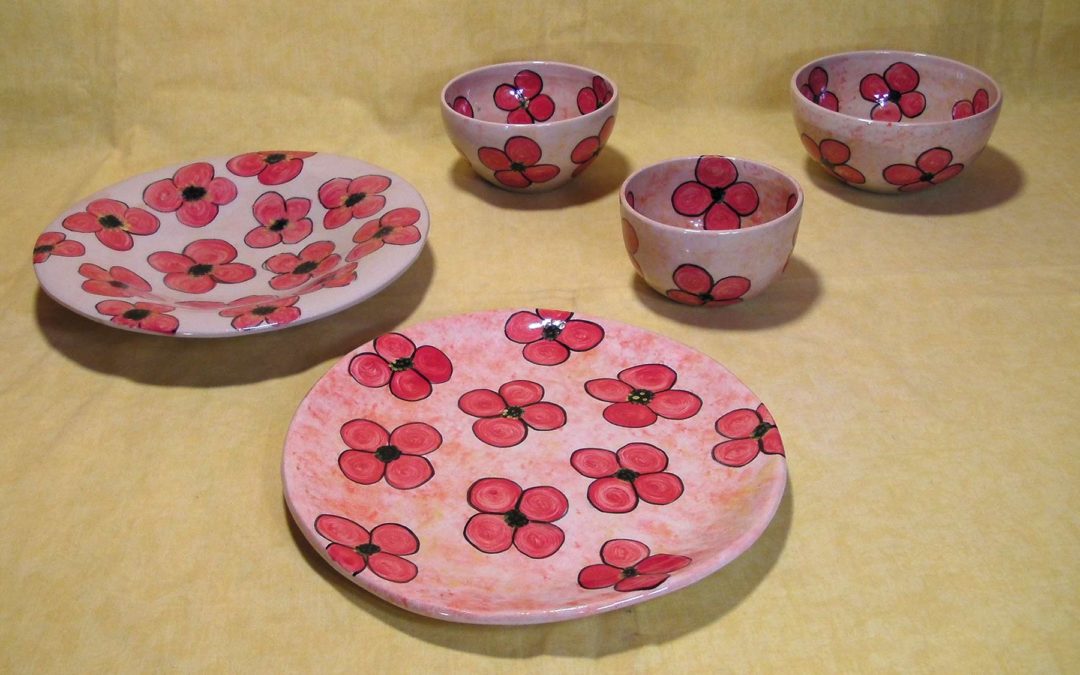 Blüten (blau oder rot)